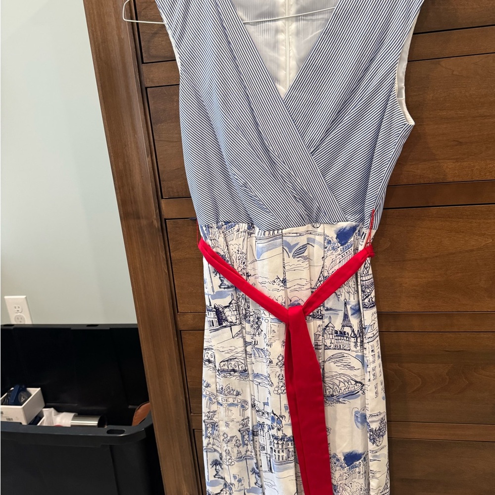 Elegant Blue and White Dress with Red Accent